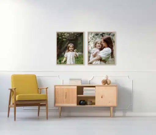 Living room with framed mother-daughter photos above a wooden console.